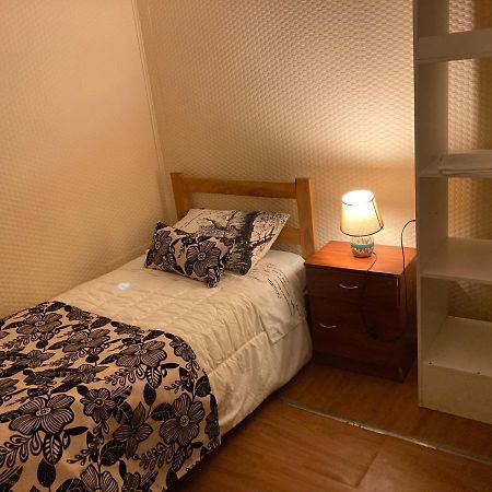 פורטו נטאלס Hostal Hellen מראה חיצוני תמונה