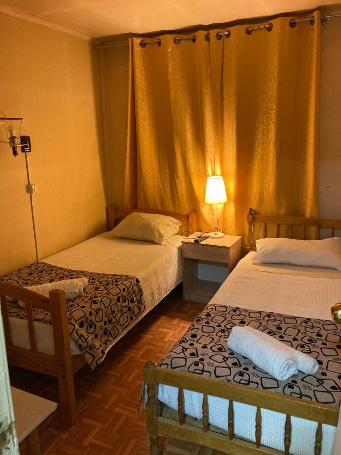 פורטו נטאלס Hostal Hellen מראה חיצוני תמונה