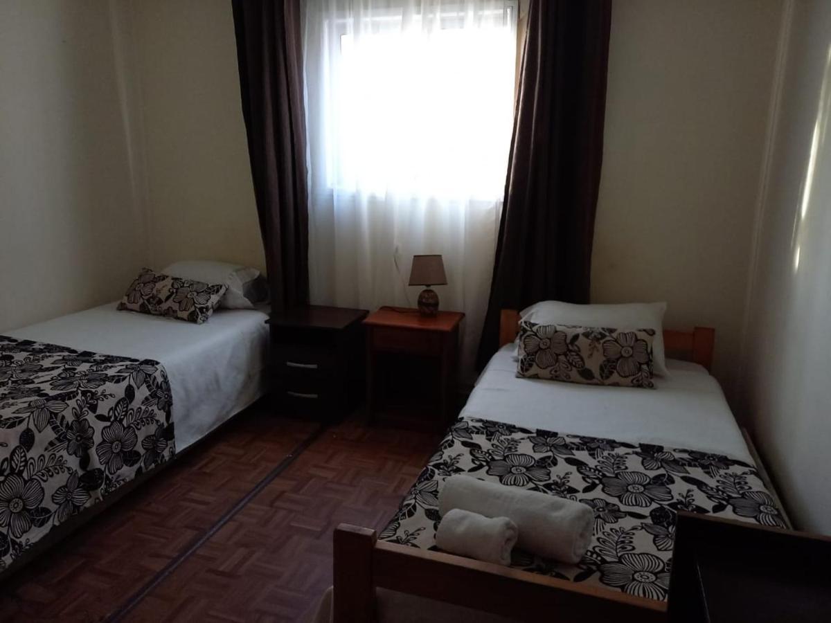 פורטו נטאלס Hostal Hellen מראה חיצוני תמונה