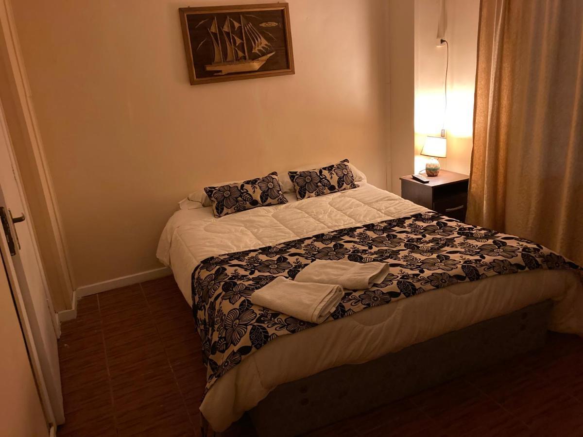 פורטו נטאלס Hostal Hellen מראה חיצוני תמונה